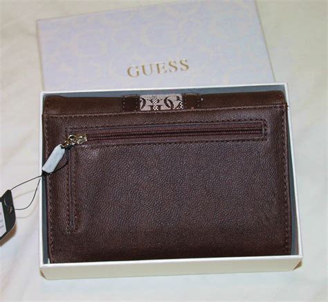 guess trifold wallets for women.